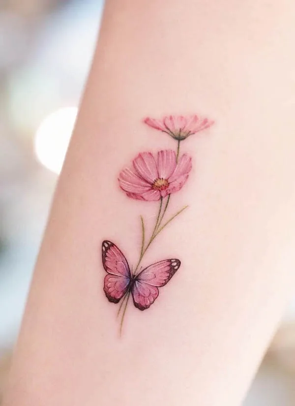 Cosmos October birth flower tattoo by @tattoo.haneu