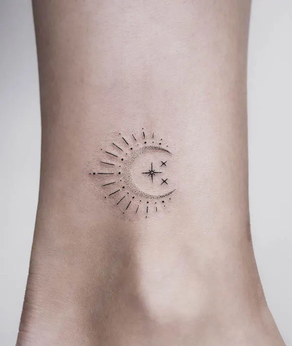 Dainty sun and moon ankle tattoo by @annarehtattoo