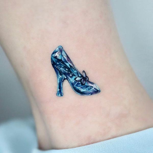Disney crystal shoes ankle tattoo by @yoda_ink