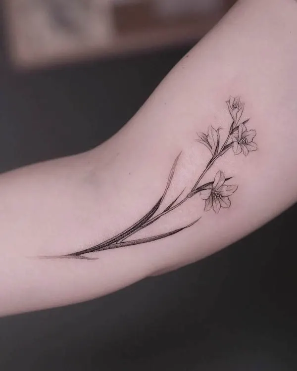 Gladiolus August birth flower tattoo by @dinna.tattooer