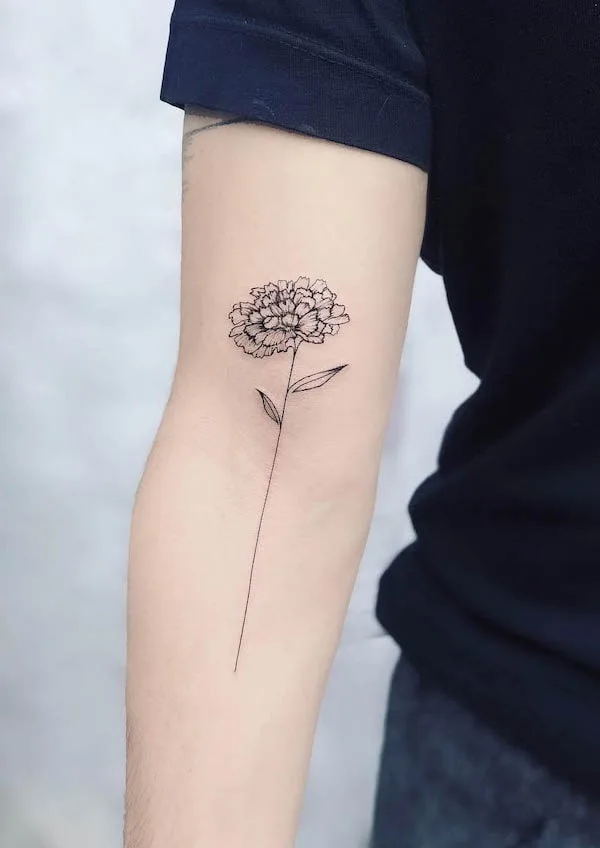 Marigold October birth flower tattoo by @fleurnoiretatto