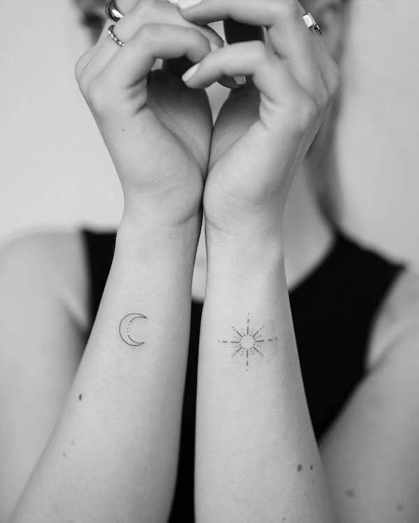 Matching sun and moon wrist tattoos by @juliapolczantattoo