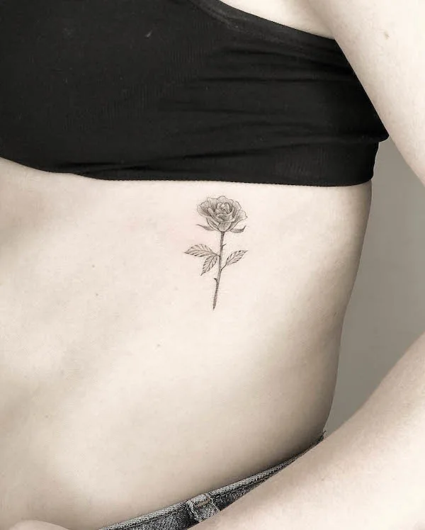 Rose June birth flower tattoo by @tattoo4unyc