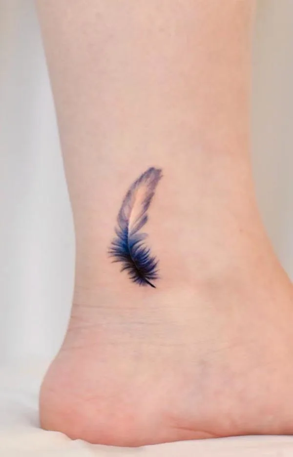 20 Dreamy Feather Tattoo Ideas & Inspiration - Brighter Craft | Feather  tattoo design, Feather tattoo for men, White feather tattoos