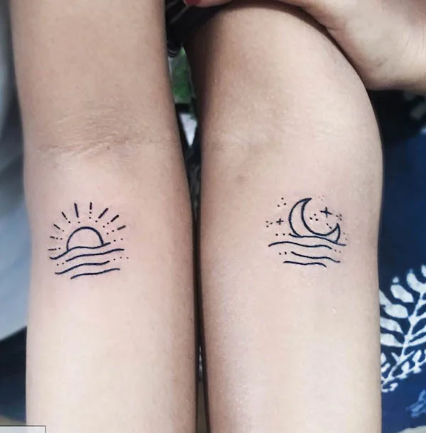 Sun and moon on the ocean tattoos by @v_inked