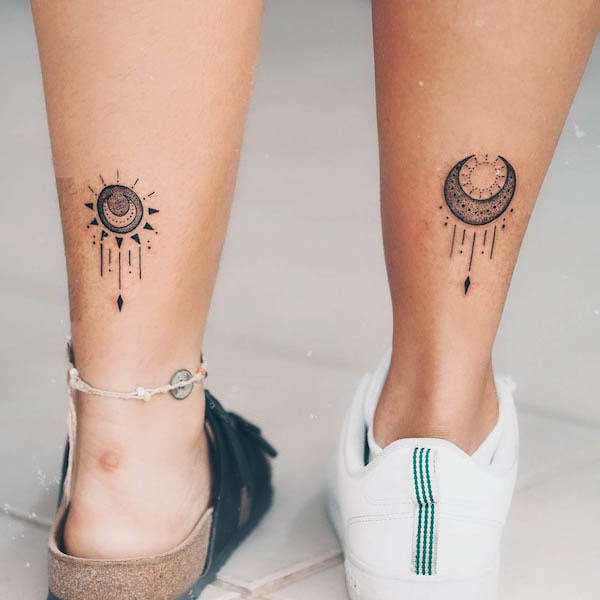 Small moon tattoo on the ankle.