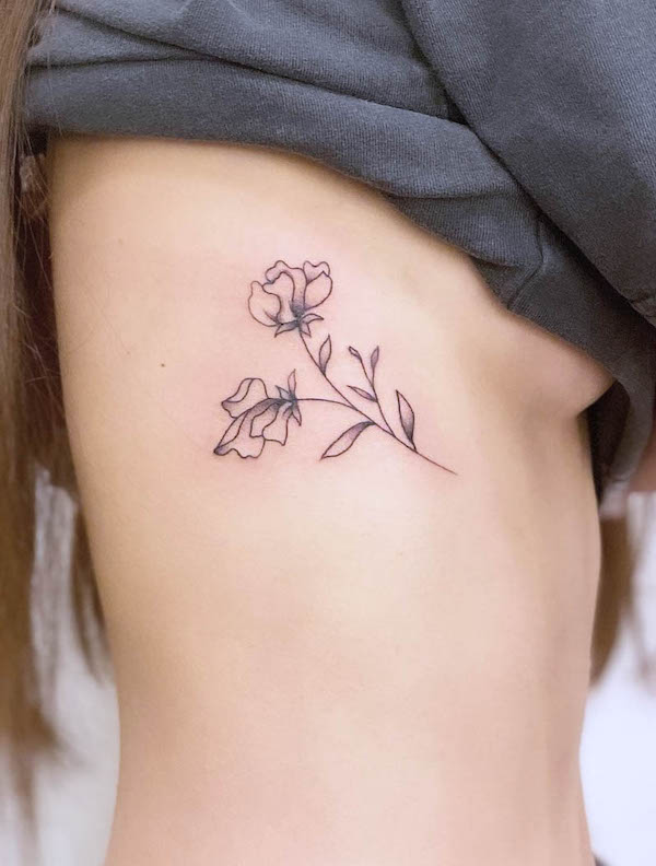 Sweet pea April birth flower tattoo by @jamezkan
