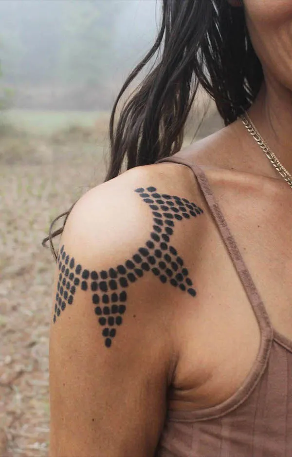 Tribal sun shoulder tattoo by @corrieforeman