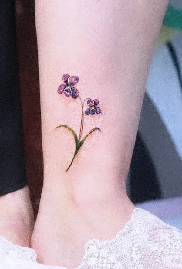 Violet February birth flower tattoo by @rose_pique