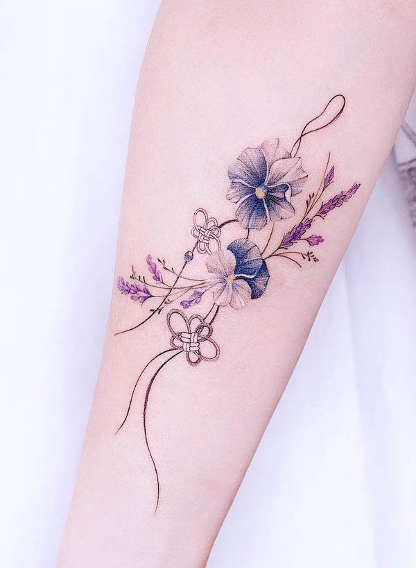 Violet February birth flower tattoo by @tattooist_arun