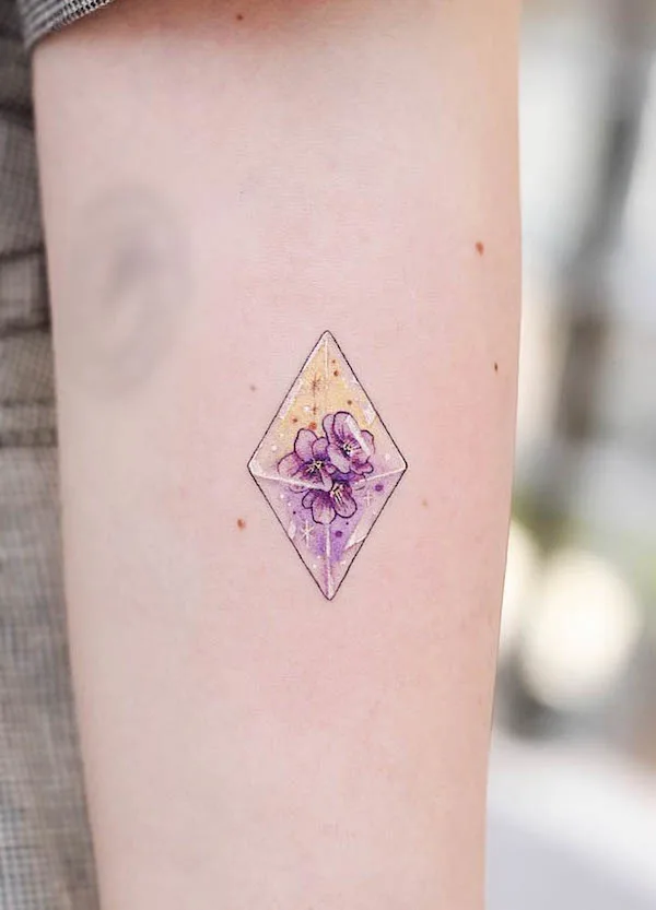 Violet February birth flower tattoo by @vismstudio