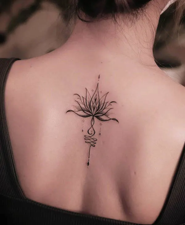 Water lily July birth flower tattoo by @sukza__art
