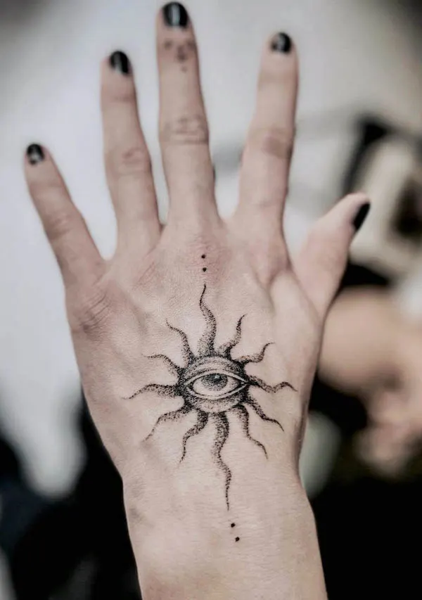 Witchy eye and sun hand tattoo by @melpzvc