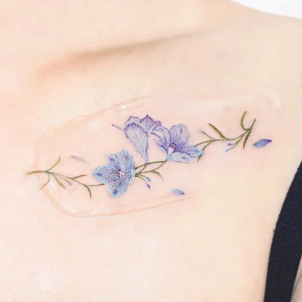 larkspur July birth flower tattoo by @tattooist_momom