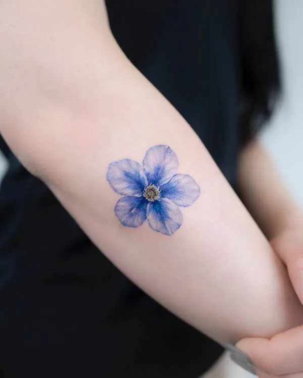 larkspur July birth flower tattoo by @vismstudio