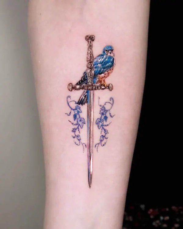 Bird and sword tattoo by @tattooist_irae2