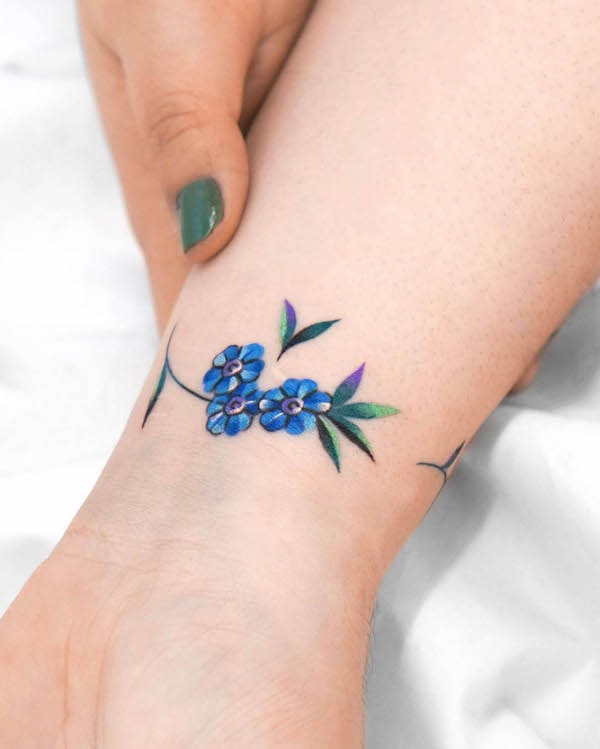 Black flower bracelet tattoo. | Wrist tattoo cover up, Band tattoo designs,  Wrist band tattoo