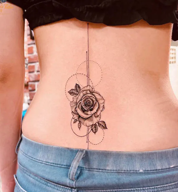 Circles and rose lower back tattoo by @masterpeacestattoo_malaysia