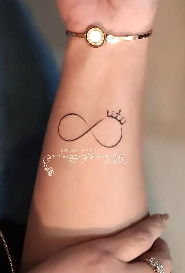 Crown and infinity tattoo by @mahnaz.tattoo.art_