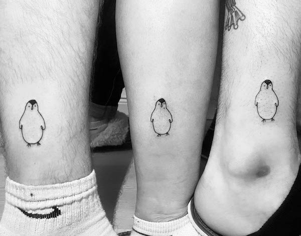 Cute matching penguin tattoos for family by @jacklean_inside