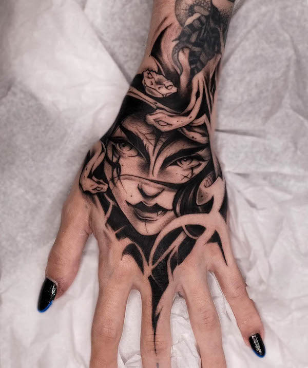 Fierce Medusa hand tattoo by @gustavoblenc