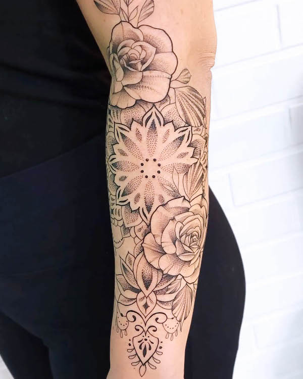 Flowers and mandala forearm tattoo by @merettetattoo