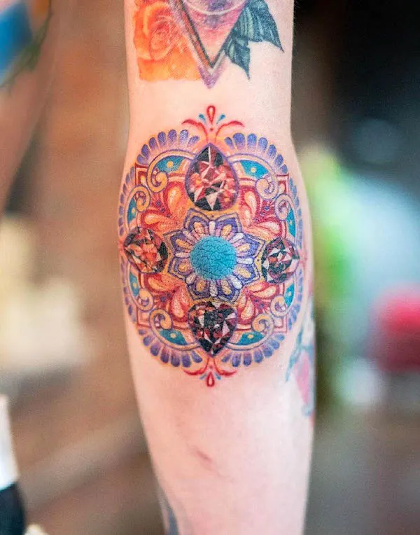 Gemstones and mandala tattoo by @mojo_tattoo