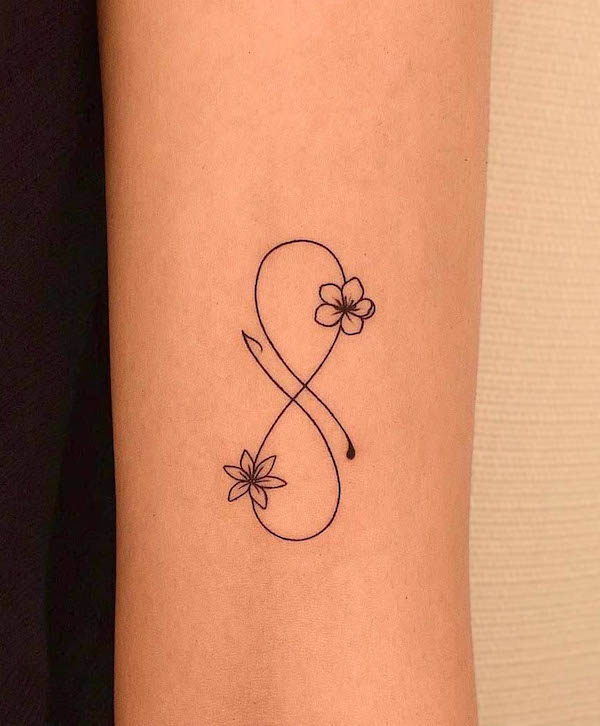 Girly infinity tattoo by @women.tattoo.tehran