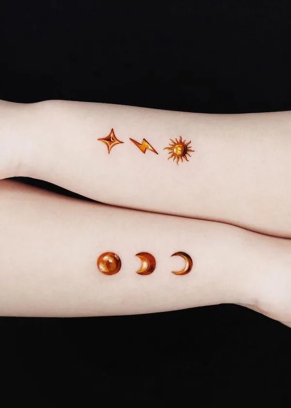 Golden natural symbols tattoo by @jooa_tattoo