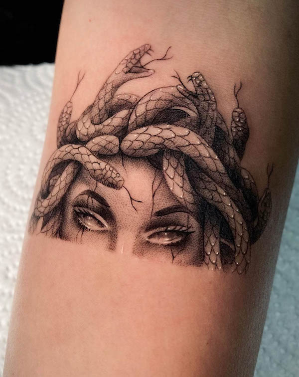 Hyper detailed half Medusa tattoo by @eljuli.tattoo