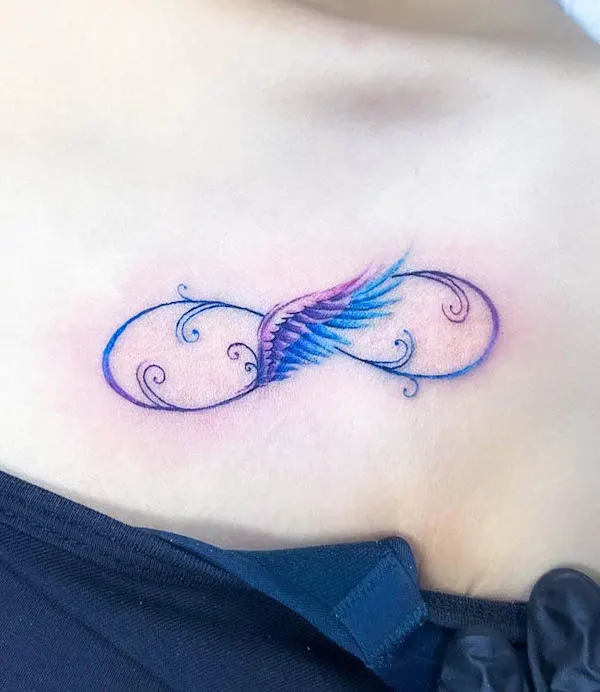 Infinity feather tattoo on the chest by @josie.tattoos