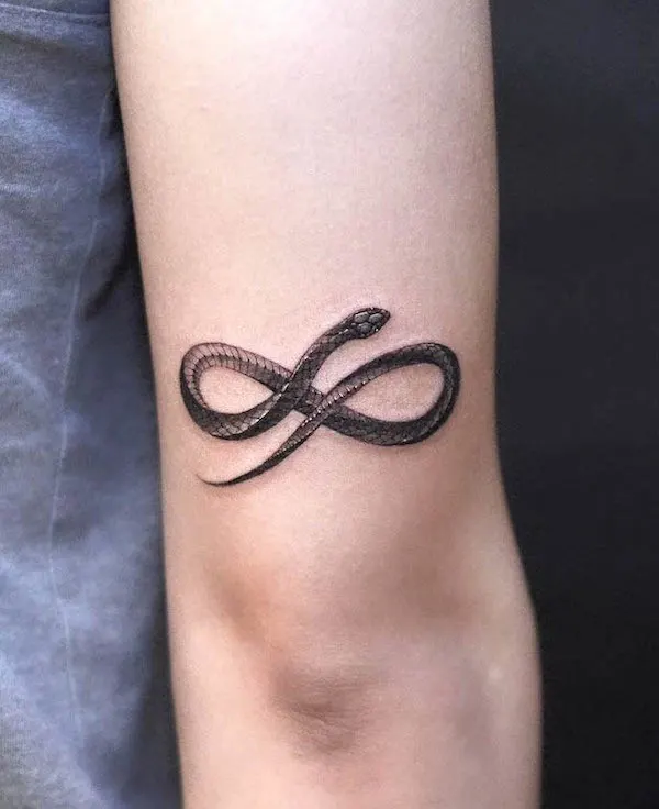 Infinity snake tattoo by @tattoo_grain