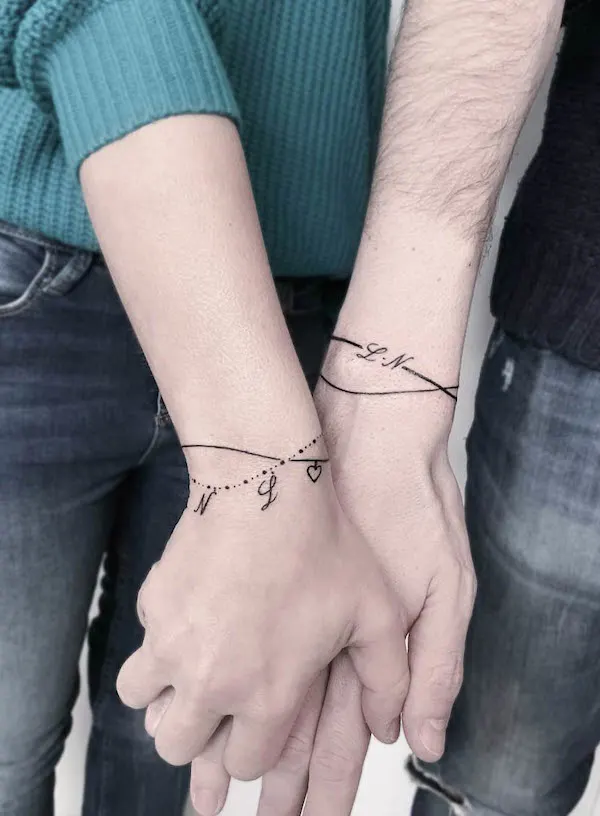 Discover 142+ heart charm bracelet tattoo latest