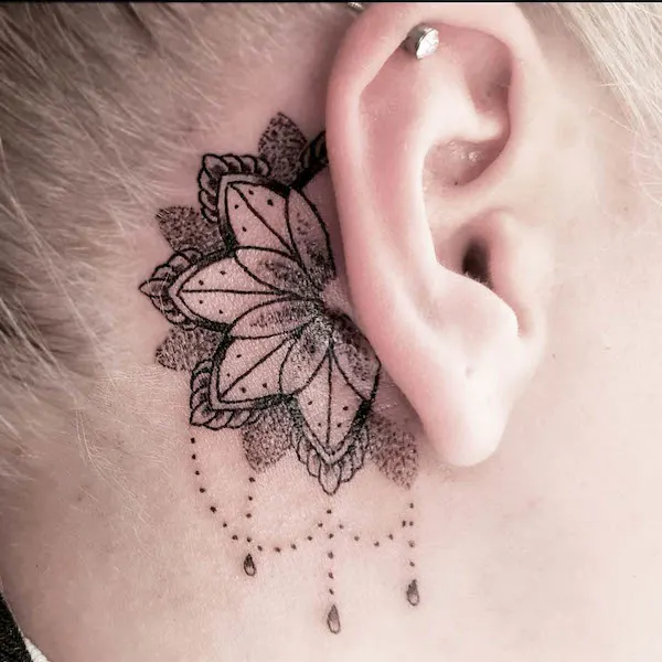 Dreamcatcher mandala tattoo behind the ear by @joey.ostner.tattoo