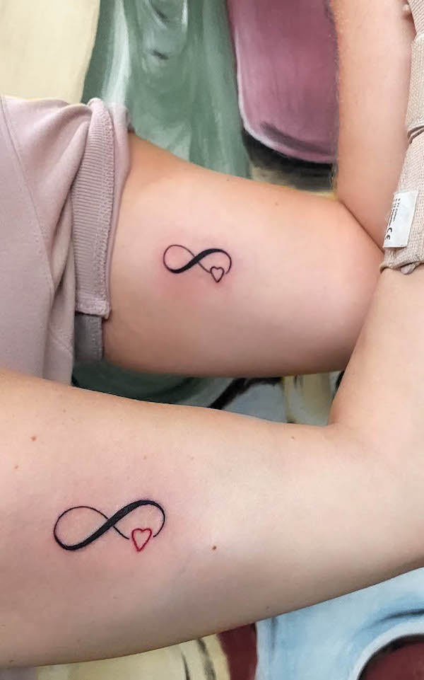 Matching infinity heart tattoos by @jelena.gajic76tattoo