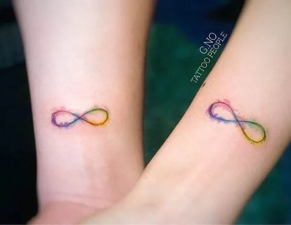 Matching watercolor infinity tattoos by @gno_tattoopeople