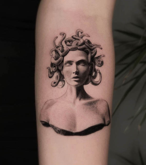 Medusa sculpture forearm tattoo by @has.tats_