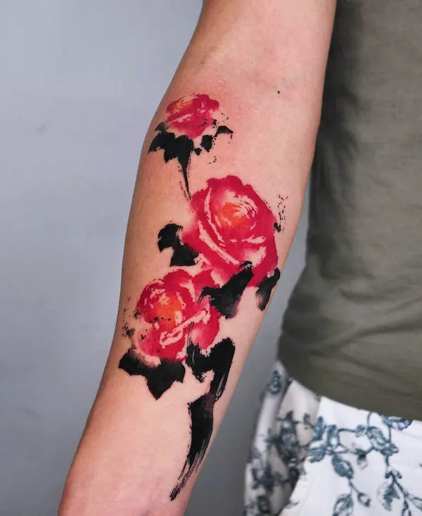 Oriental ink painting rose tattoo on the forearm by @hanu.classic