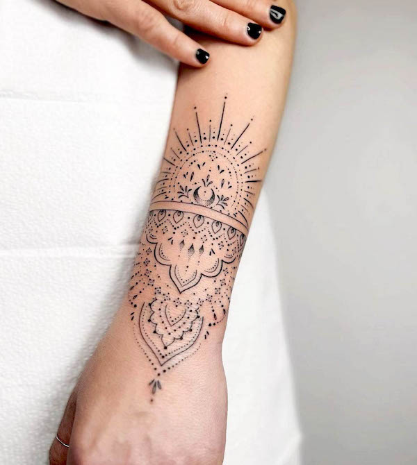 Ornamental mandala wrist tattoo by @anais_chabane
