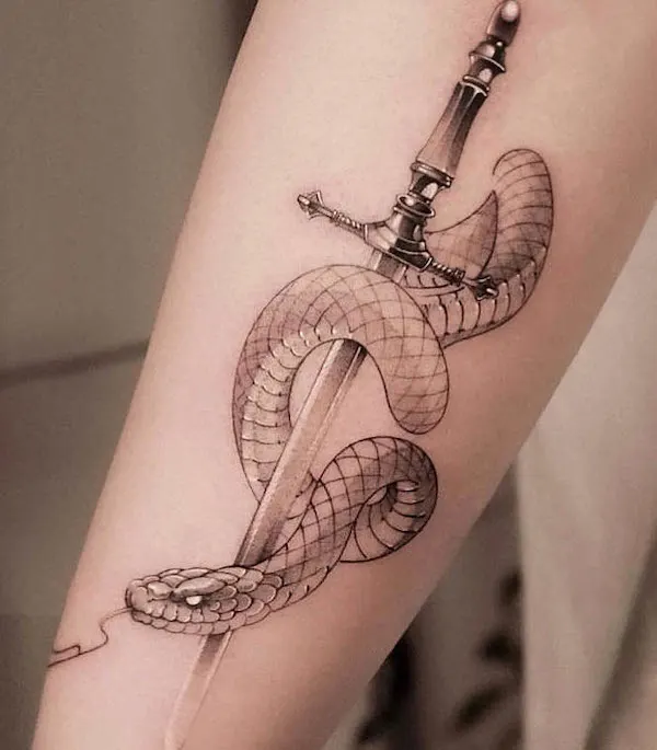 Realism snake and sword tattoo by @exp.haus