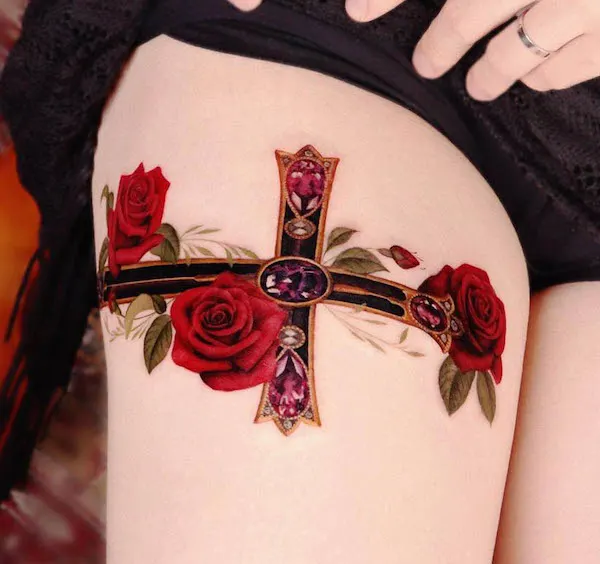 Rose and cross thigh tattoo by @peria_tattoo