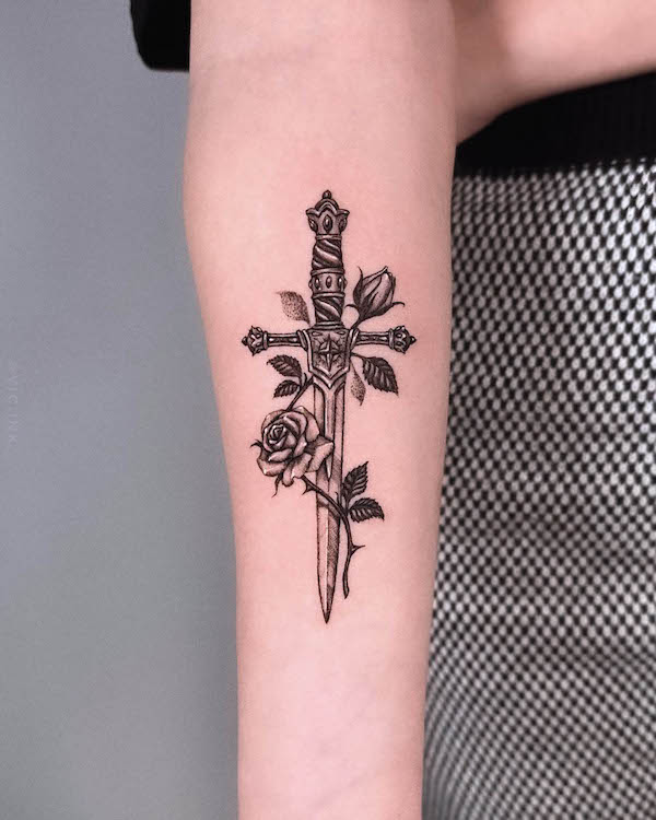 Rose and dagger blackwork by @vic.ink_