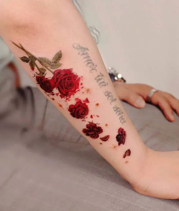 Rose and petals forearm tattoo by @peria_tattoo