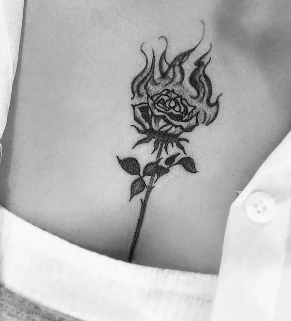 Rose on fire tattoo by @xrx.tattoo