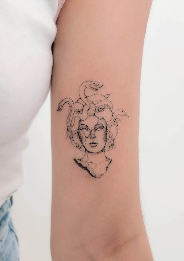 Simple Medusa bicep tattoo by @bellafineline
