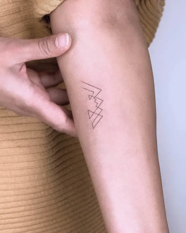 Simple geometric mountain tattoo by @tattoobychang