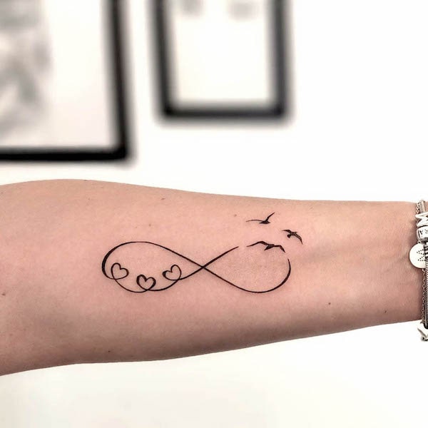Infinity tattoo with Birds always Idk bout the always part but I  definitely love the birds I wouldnt get it  Infinity tattoos Infinity  tattoo Trendy tattoos
