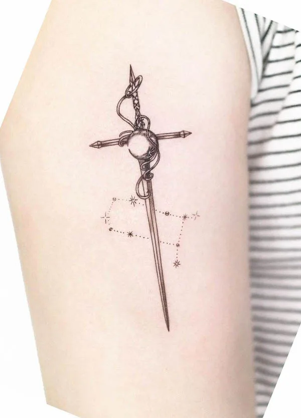Small constellation and sword tattoo by @ire_tattoo