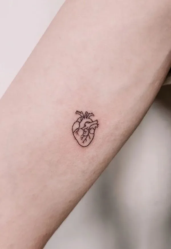 Small heart tattoo by