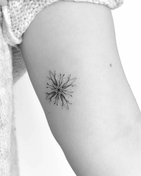 Small botanical mandala arm tattoo by @mrs.tattoo_